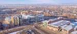 Vista aérea panorámica del complejo CSU Spur en Denver con edificios y entorno urbano