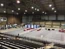 Vista general del interior del Hale Arena con gradas y escenario central