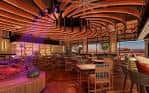 Interior del bar Category 10 con iluminación cálida y diseño moderno