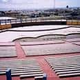 Auditorio al aire libre en el Parque de San Juan con gradas y escenario