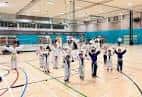 Clase de taekwondo en el gimnasio del Glasgow Club Bellahouston