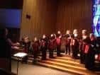 Coro en actuación dentro del auditorio de Blueprint Ensemble Arts
