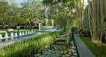 Jardín paisajístico con sendero, estanque y vegetación densa