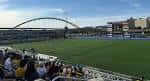 Vista panorámica del F.N.B. Stadium con el campo de juego y la grada llena