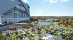 Panorámica del espacio al aire libre con áreas verdes y estructuras contemporáneas para eventos
