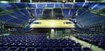 Vista interior del Chaifetz Arena con asientos azules y escenario central