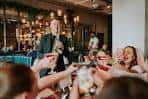 Interior del All Bar One Sheffield con ambiente festivo y brindis