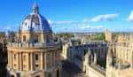 Panorámica aérea del centro histórico de Oxford destacando la cúpula del Radcliffe Camera y edificios universitarios clásicos