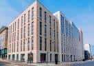 Vista exterior del edificio iQ Cullen House en Easterhouse, Glasgow