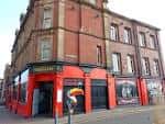 Fachada exterior del pub The Four Leaf en Sheffield con detalles arquitectónicos victorianos