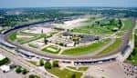 Vista aérea panorámica del Indianapolis Motor Speedway mostrando el circuito ovalado y las instalaciones