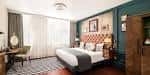Habitación de lujo con cama king-size y decoración elegante