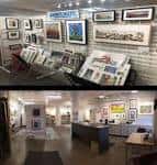 Galería de arte dentro del edificio con obras expuestas y mobiliario