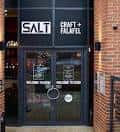 Entrada principal de SALT Granary Wharf con fachada moderna y rótulo claro