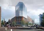Edificio emblemático con fachada de cristal y diseño contemporáneo