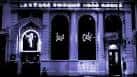 Fachada nocturna del The Jazz Cafe con su letrero iluminado