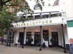 Fachada exterior de Slug & Lettuce en Nottingham con terraza superior