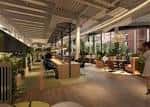 Interior de oficina moderna con zona de descanso y plantas