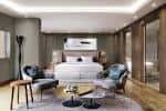 Habitación de lujo del hotel con cama king-size, mobiliario contemporáneo y iluminación ambiental