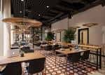 Interior de la zona común con mesas y sillas modernas