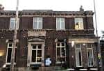 Fachada principal del pub en Lark Lane durante el día
