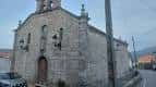 Fachada principal de la Iglesia de San Miguel de Oia, construida en piedra