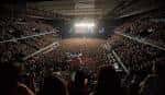 Interior del Navarra Arena durante un evento con el público llenando las gradas.
