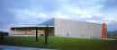Fachada moderna del Palacio de Deportes Adolfo Suárez en Gijón