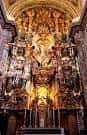 Detalle del majestuoso Retablo Mayor barroco en el interior del templo