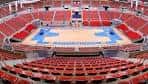 Vista panorámica de las gradas y la cancha deportiva desde la zona superior