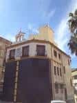 Fachada de la Casa Hermandad del Prendimiento con gran portón de salida procesional