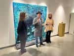 Sala de exposiciones de la Fundación Caja Rural del Sur con obras de arte expuestas