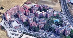 Vista aérea de la urbanización Parque Miraflores en Fuenlabrada, mostrando bloques residenciales y zonas verdes