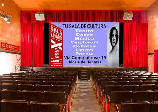 Vista general del interior del auditorio con butacas y escenario