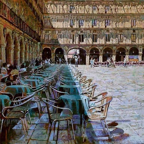 Plaza histórica con mesas y sillas dispuestas al aire libre, estilo pictórico