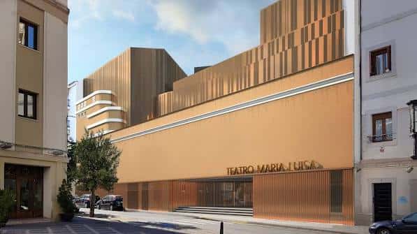 Fachada exterior del Teatro María Luisa con diseño moderno y fachada de madera en tonos cálidos