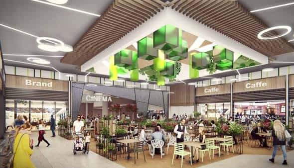 Render del interior del centro comercial mostrando la zona de restauración y cine