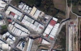 Plano aéreo detallado de las parcelas industriales del Polígono O Ceao, con edificaciones de techos blancos y rojos organizadas en bloques