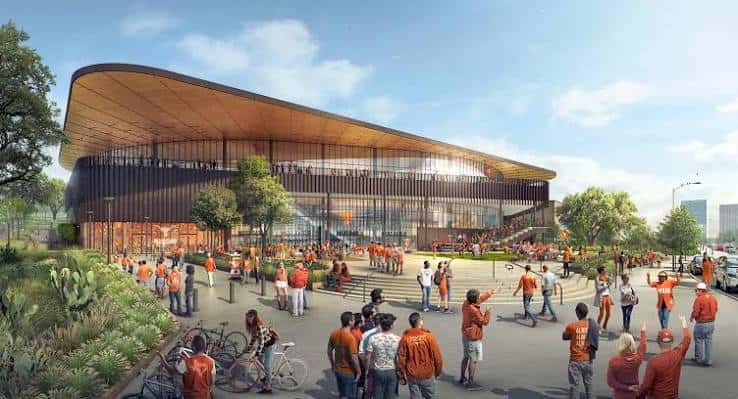 Render arquitectónico de la entrada principal del Moody Center con visitantes y entorno paisajístico