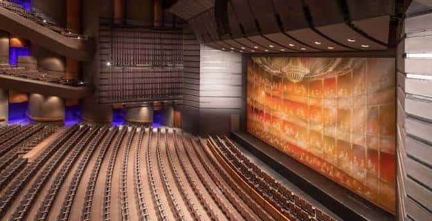 Interior del hall con vista al escenario y diseño arquitectónico moderno