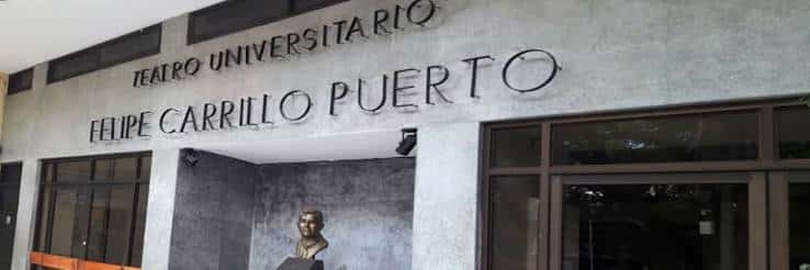 Fachada exterior del Teatro Felipe Carrillo Puerto con busto y letrero