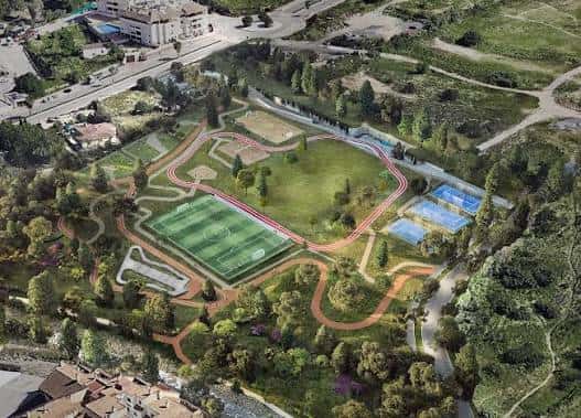 Render arquitectónico del parque con campos de fútbol y zonas verdes integradas