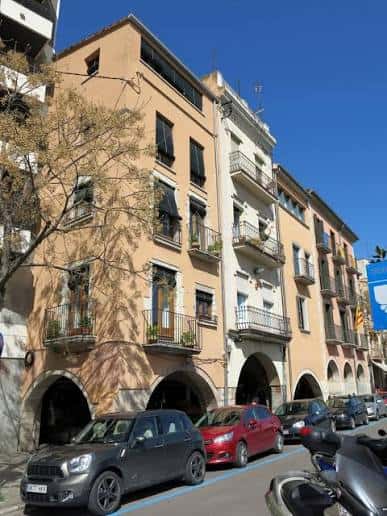 Fachada de edificios con porxos en la Plaça de Catalunya