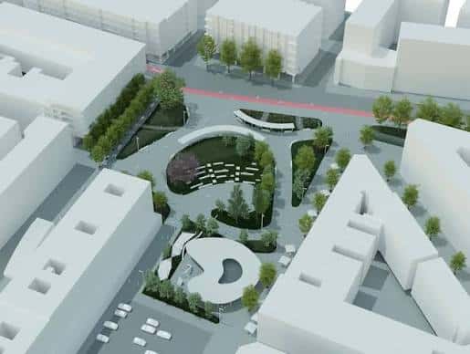 Vista aérea del diseño urbanístico de la plaza con elementos paisajísticos