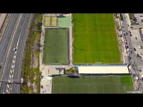 Vista aérea de la Ciudad Deportiva Gómez Meseguer mostrando múltiples campos de fútbol y pistas deportivas
