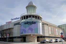 Fachada exterior del Centro Comercial El Mirador de Cuenca con el logotipo visible