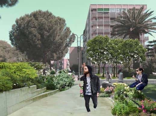 Vista de la plaza con personas caminando y edificios residenciales al fondo