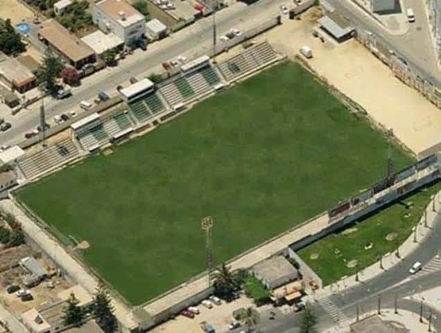 Vista aérea del Estadio El Palmar mostrando su ubicación urbana y estructura completa