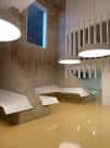 Espacio interior moderno de la Facultad de Derecho con iluminación circular y diseño minimalista