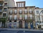 Fachada de un edificio histórico en la Calle Progreso
